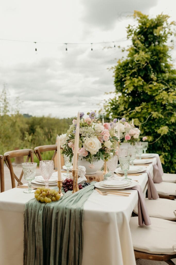 Romantic outdoor wedding reception at Hillside Farms barn wedding venue in Olympia Washington with string lights and sweetheart table